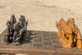 African chess, hand made from baobab wood. African style wooden figurine, local art Royalty Free Stock Photo