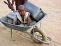 African child in a wheelbarrow