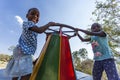 African children on merry-go-round