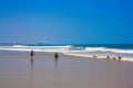 African children play in ocean waves Royalty Free Stock Photo