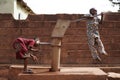 African Children Playing At the Village Water Pump Royalty Free Stock Photo