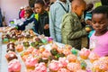 African children receiving cupcakes at Soup Kitchen volunteer community outreach program at orphanage