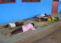 African children sleeping on the floor