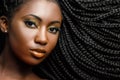 African cosmetic portrait of woman showing braided hairstyle. Royalty Free Stock Photo