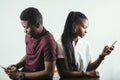 African Couple Holding Mobile Phones In a Hand Royalty Free Stock Photo