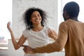 African couple in love enjoy romantic date dancing indoors Royalty Free Stock Photo