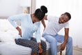Couple Suffering From Back Pain