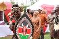 African dancers dressed in traditional regalia singing at a Kikuyu wedding ceremony in Kenya