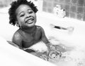 African descent kid enjoying bath tub Royalty Free Stock Photo