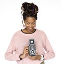 African descent woman hold camera in a shoot