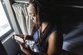 African descent woman with mobile phone calling out Royalty Free Stock Photo