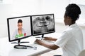 African Doctor In Video Conference Call Talking Royalty Free Stock Photo