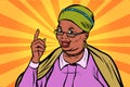 African elderly woman pointing finger up