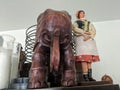 African Elephant Book Shelf Next To Russian Doll