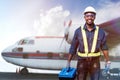 African engineer technician maintenance man checking and fixing the engine of the airplane with use tools and wrench Royalty Free Stock Photo