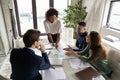 African ethnicity female speaker presenting company financial results. Royalty Free Stock Photo