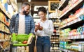 African Family Buying Food In Supermarket Walking Choosing Groceries Together Royalty Free Stock Photo