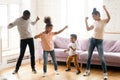 African family with children dancing in modern living room Royalty Free Stock Photo