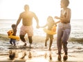 African family enjoying the beach