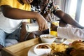 African family having breakfast in bed Royalty Free Stock Photo