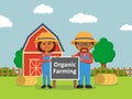 African farmer holding organic farming sign