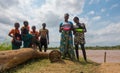 African farmers family eating lunch at Sabaki river