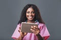 An African doctor consults a patient, makes a video call from a webcam on the tablet screen. Telemedicine videoconference remote Royalty Free Stock Photo