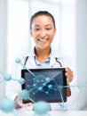 African female doctor with tablet pc and molecules