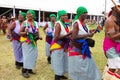 African female performers in traditional clothes at the outdoor cultural event