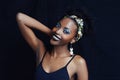 African female person, fashion and studio for makeup, lipstick and smile for eye shadow. Black woman model, dark