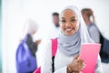 African female student with group of friends