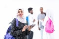 African female student with group of friends