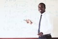 African foreign teacher teaching  science in the classroom Royalty Free Stock Photo