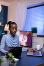 African freelancer using tablet pc working from home Royalty Free Stock Photo