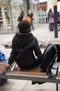 African-French people sitting and waitting train at Gare de Paris-Est