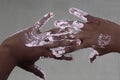 African girl with dirty hands paint Royalty Free Stock Photo