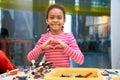 African girl showing heart gesture. Royalty Free Stock Photo