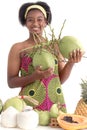 African girl teen with curly hair wearing traditional clothes, holding tropical coconut fruits. Happy smiling African woman Royalty Free Stock Photo