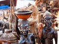 African handcraft dark wood carved figures Royalty Free Stock Photo