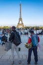 African immigrants sell souvenirs of small Eiffel Tower At Trocadero, in Paris, France.