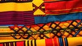 African Kente cloth, a vibrant and richly patterned fabric from Ghana, featuring bold and colorful interwoven geometric