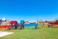 African kids playing on Jungle Gym and other park equipment at local public playground Royalty Free Stock Photo