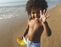 African little boy playing at the beach Royalty Free Stock Photo