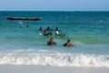 African little children, small kids play at sea beach