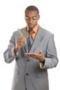 African maerican business man holding a pencil Royalty Free Stock Photo