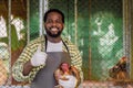 african male farmer worker standing portrait in livestock farm small business owner happy smile Royalty Free Stock Photo