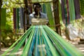 An african male performing traditional weaving in Gambia Royalty Free Stock Photo