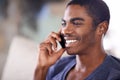 African man, phone call and home on sofa with smile for conversation, contact and listening in lounge. Person Royalty Free Stock Photo