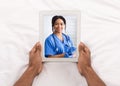 African Man Using Digital Tablet, Having Video Chat With Black Therapist Woman Royalty Free Stock Photo