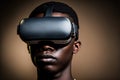 African man wearing virtual reality goggles standing studio clean background Royalty Free Stock Photo